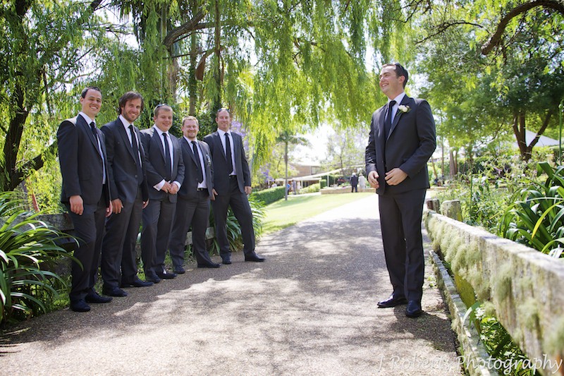 Groom and his groomsmen on rustic country bridge - wedding photography sydney